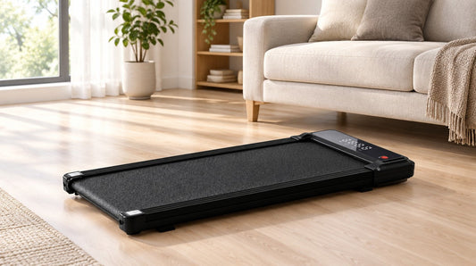 Compact walking pad on a living room floor, with space to slide it under the sofa